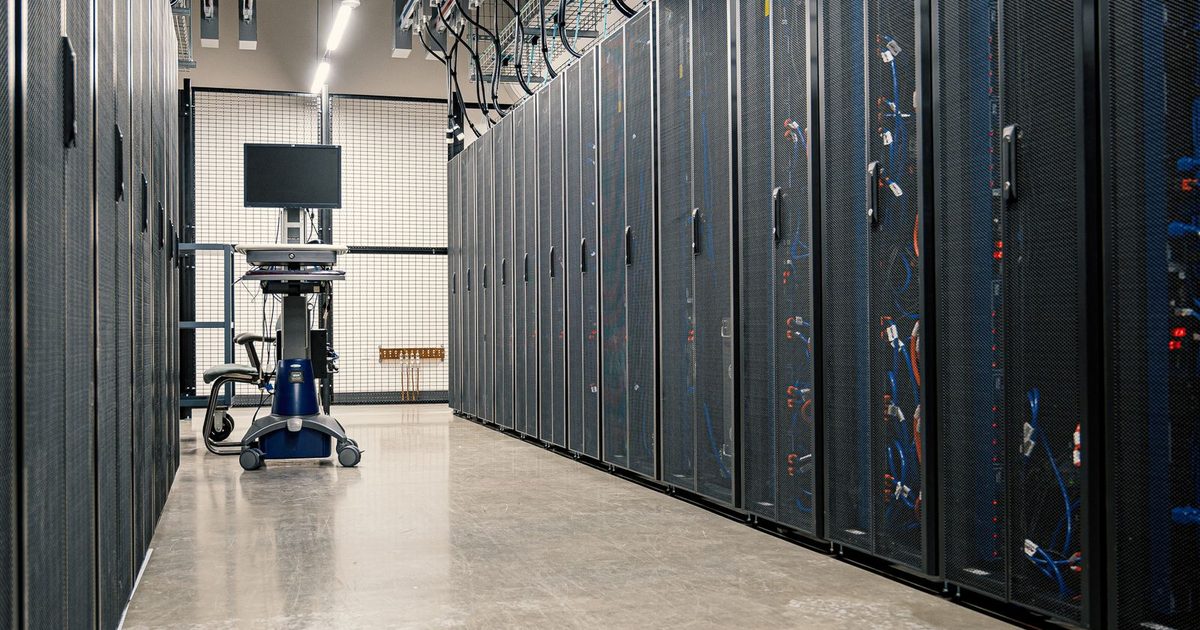 Rows of server racks in an enterprise data centre